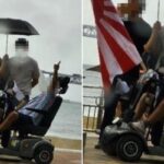광안리 해수욕장에 ‘욱일기’ 꽂은 전동휠체어 타고 나타난 70대 男… “또 나오겠다”