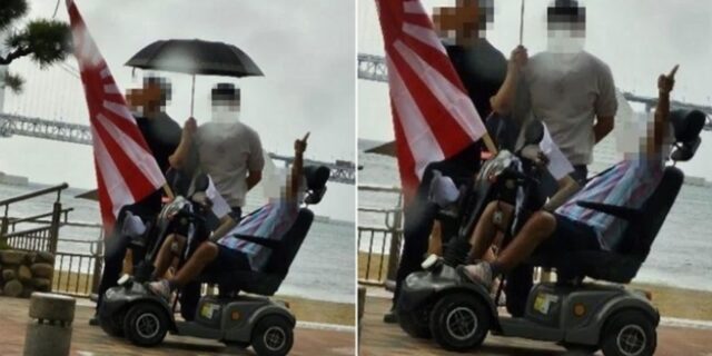 광안리 해수욕장에 ‘욱일기’ 꽂은 전동휠체어 타고 나타난 70대 男… “또 나오겠다”
